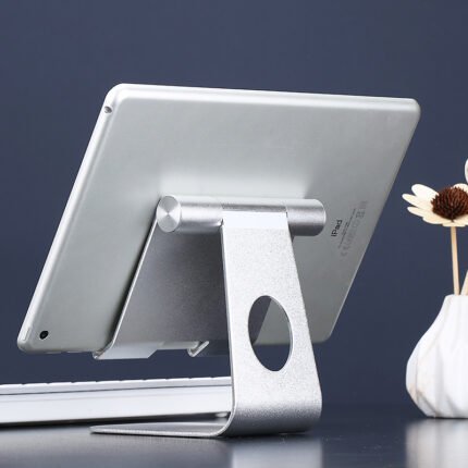 Adjustable tablet stand holding an iPad on a desk
